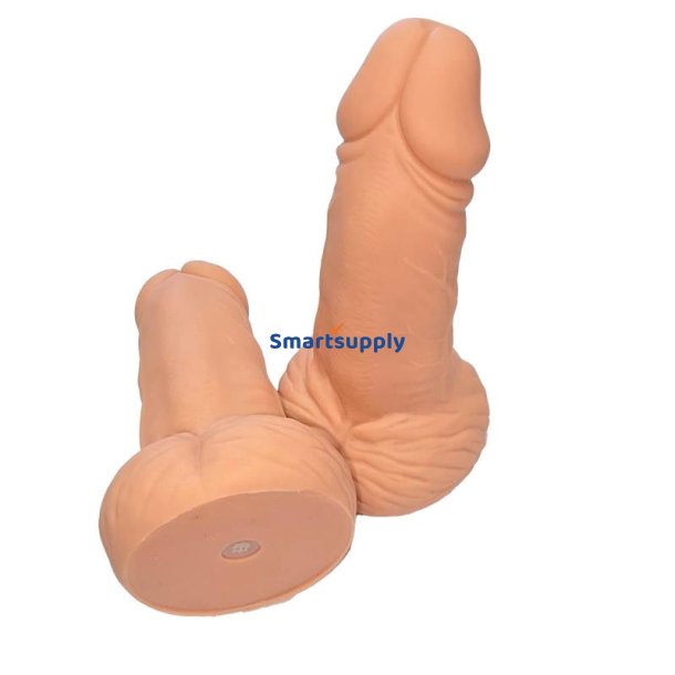 Penis-shaped whistle with testicles