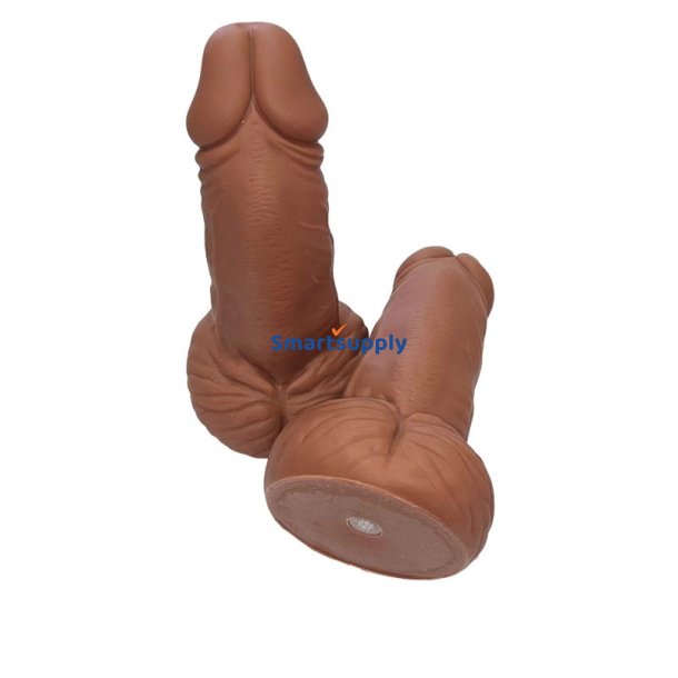 Penis-shaped whistle with testicles